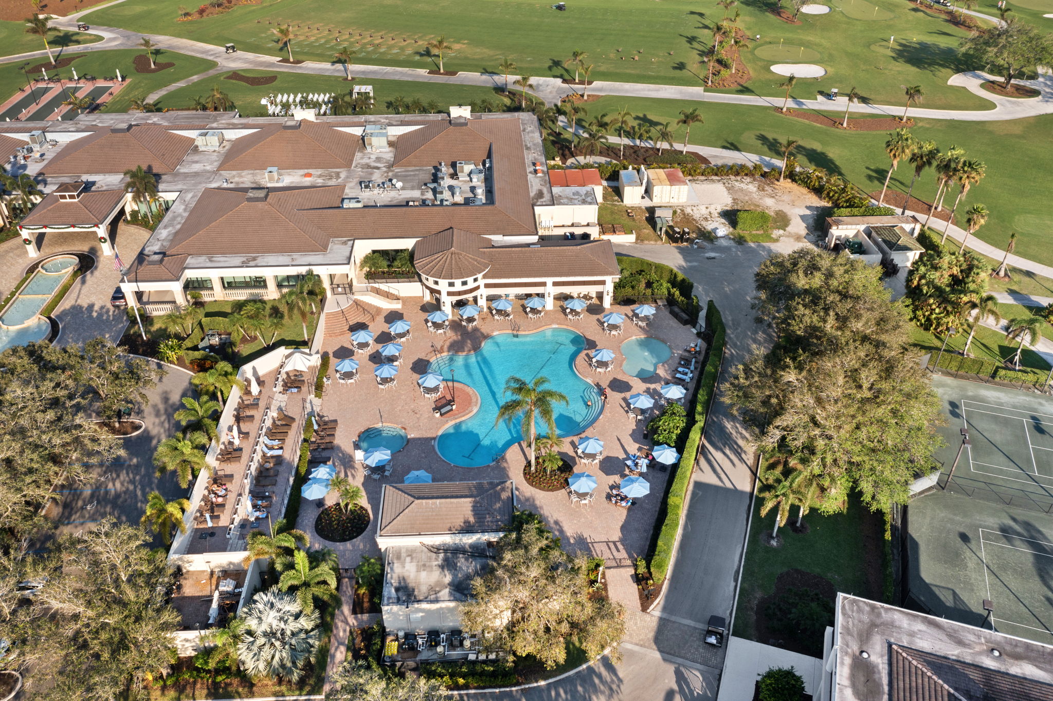 Bird's-eye view of the resort and pool area, illustrating the amenities and scenic environment.