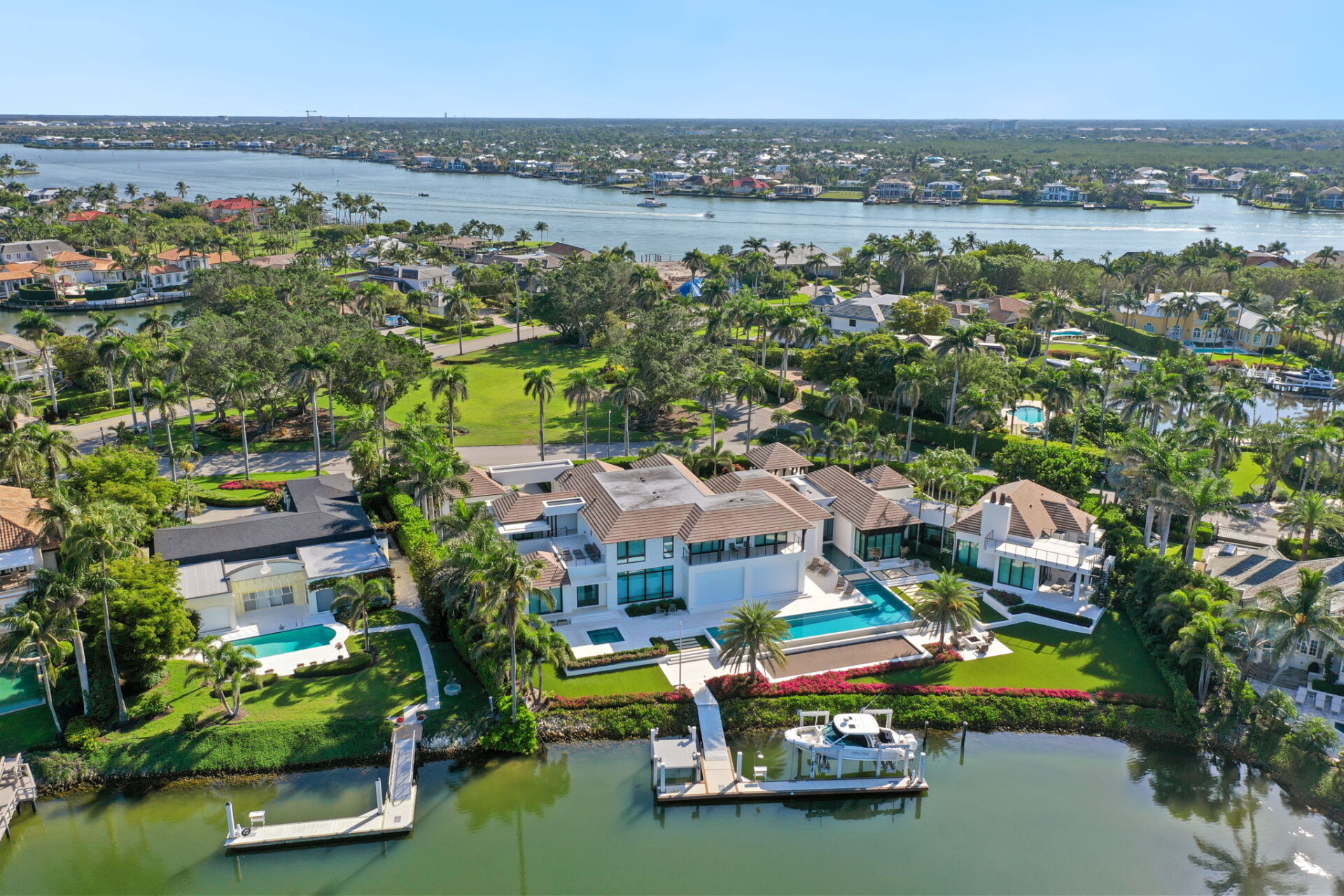 luxury homes, boat docks, boats, bay, golf of America, 