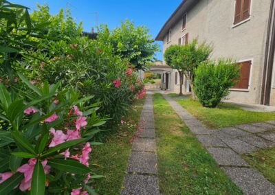 Renovated Italian village home with flowering garden and walking paths near Desenzano del Garda and Lake Garda, Italy